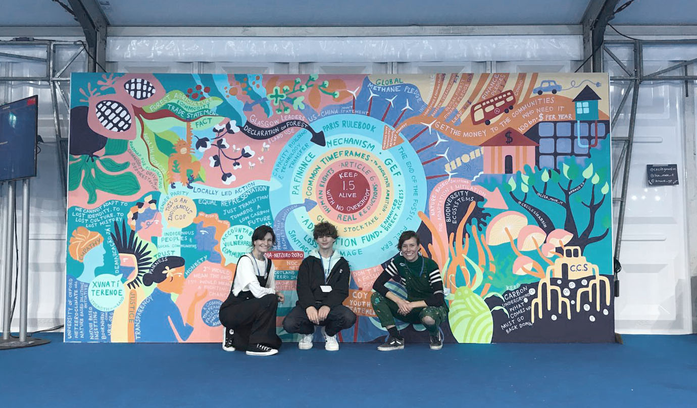 Cecile infront of her mural